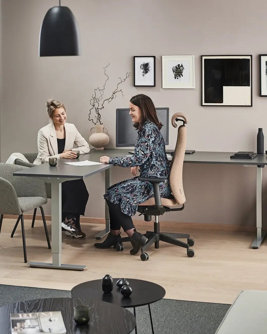 Two women sitting in an office